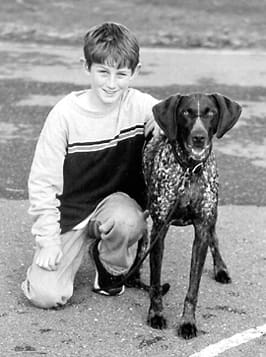 kid and dog bonding