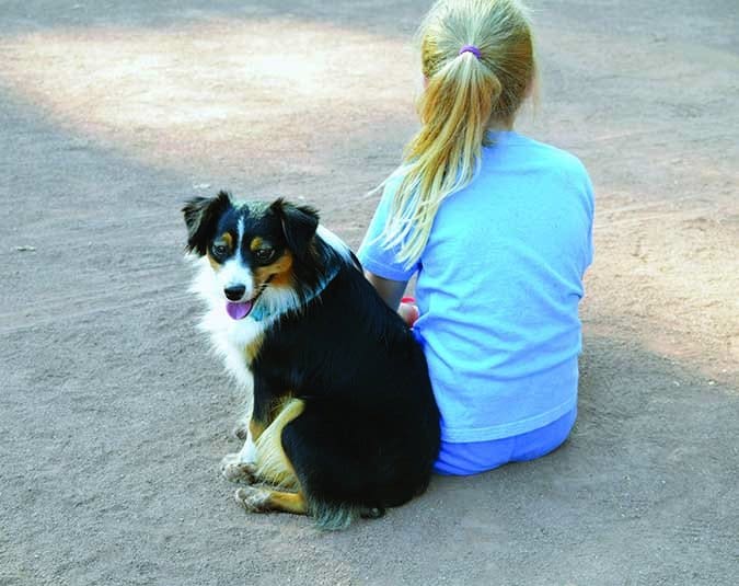 young girl and dog