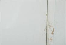 Compulsive scratching at doors can indicate separation anxiety in dogs which is causing them to act out.