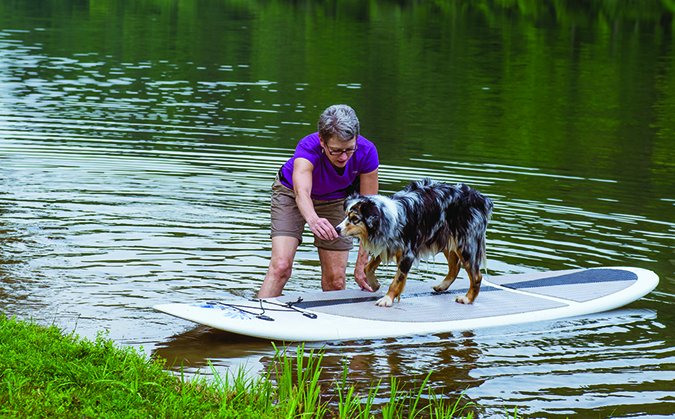 paddleboarding with a dog