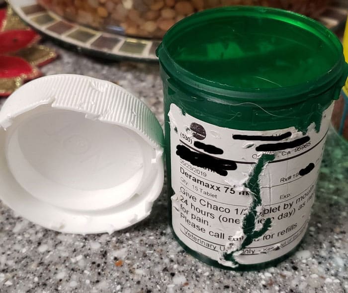 chewed-up medicine bottle