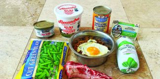 Healthy dog food additives like fruit and eggs can boost your dog's nutritional intake.