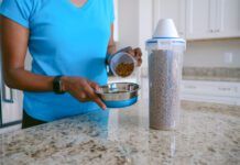 Woman Pours Pet Food Into Bowl