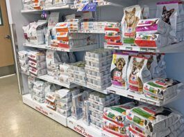 Low protein dog food is one of many prescription foods for pets pictured here in a display.