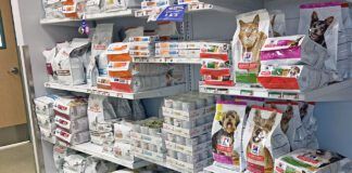 Low protein dog food is one of many prescription foods for pets pictured here in a display.