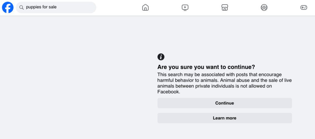 A Facebook warning message detailing that live animal trading is not allowed.